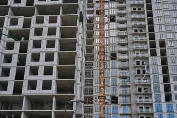 Construction site. High rise Building under construction. Construction of high-rise residential building