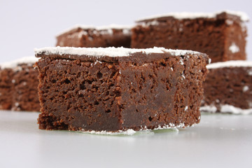 A studio photograph of chocolate brownies