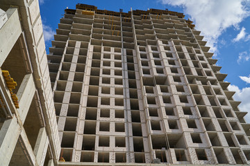 Construction site. High rise Building under construction. Construction of high-rise residential building