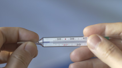 Detail of reset gallium column in fever thermomether