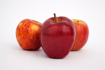 A studio photograph of apples against a white background