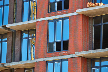 Construction site. High rise Building under construction. Construction of high-rise residential building