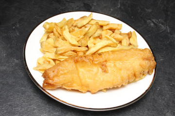 A plate of fish and chips from an English fish and chips shop
