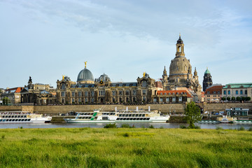 The riverside of Dresden with the church Frauenkirche and the river Elbe