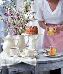bundt cake.  Easter orthodox sweet bread with flowers.  Easter breakfast table setting. Decoration for Easter family celebration.