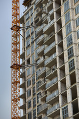 Construction site. High rise Building under construction. Construction of high-rise residential building