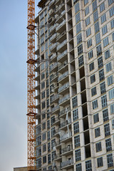 Construction site. High rise Building under construction. Construction of high-rise residential building