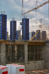 Construction site. High rise Building under construction. Construction of high-rise residential building