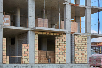 Construction site. High rise Building under construction. Construction of high-rise residential building