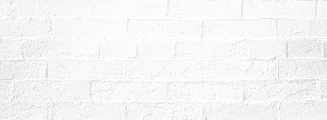 White brick wall background. Neutral texture of a flat brick wall close-up.
