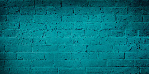 Blue teal brick wall background. Neutral texture of a flat brick wall close-up.