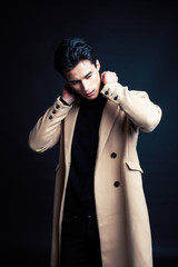 handsome asian fashion looking man posing in studio on black background, lifestyle modern people concept