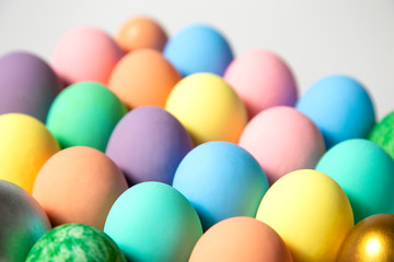 Fototapeta na wymiar Many colorful easter eggs on white background