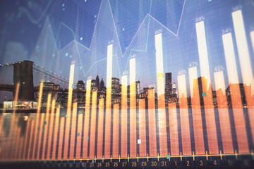 Obraz premium Financial graph on night city scape with tall buildings background double exposure. Analysis concept.