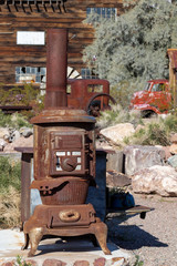 Antique wood burning stove on hearth