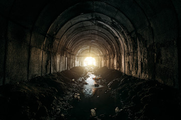 Light at the end of dirty sewer tunnel