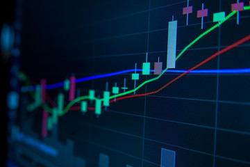 Blue Stock Exchange Market trading graph on screen monitor for economic and financial investment. Business analysis chart display. Stock invest infomation.