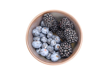 Blueberry and Blackberry on blown cup with white background, fruit concept