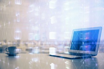 Double exposure of computer and technology theme hologram. Concept of freelance work.