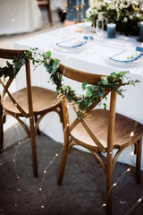 The bride and groom chairs signs