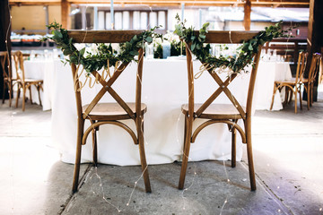 The bride and groom chairs signs