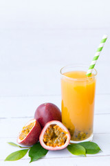 fresh passion fruit  juice smoothies isolated on white wooden background, Healthy drink concept, Selective focus, Copy space.