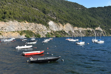 Fototapeta na wymiar Beautiful landscape of boats on blue lake