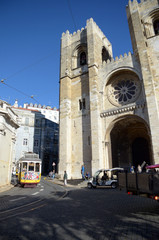 Fototapeta na wymiar Lisbon cathedral with a streetcar