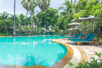 landscape swimming pool blue sky with clouds. Tropical beautiful hotel in thailand.