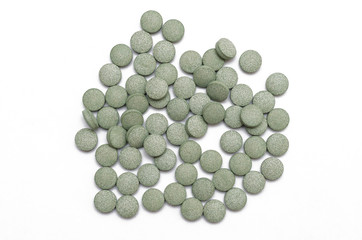 vitamins in tablets on an isolated white background