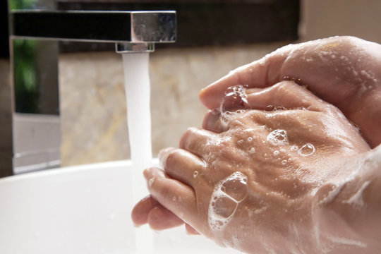 Hygiene. Cleaning Hands With Soap And Water. Washing Hands On Sink. Preventing Diseases By Washing Your Hands.