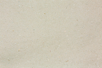 light brown recycled paper or cardboard background. high resolution pattern