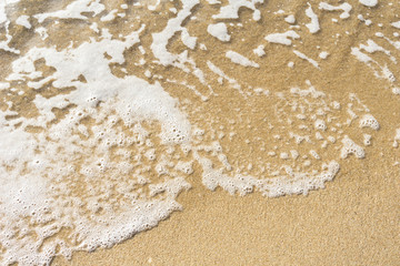 Soft wave on sand beach with copy space