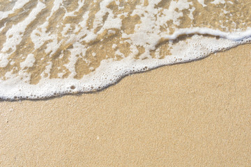 Soft wave on sand beach with copy space