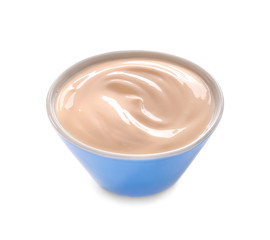 Bowl with tasty yogurt on white background