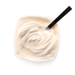 Bowl with tasty yogurt on white background