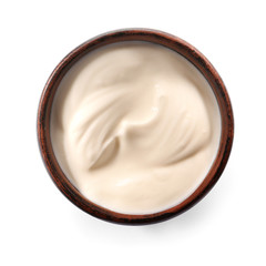 Bowl with tasty yogurt on white background