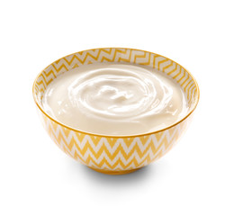 Bowl with tasty yogurt on white background