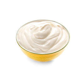 Bowl with tasty yogurt on white background