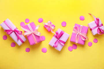 Many Birthday gifts on color background