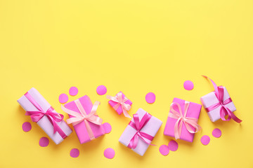 Many Birthday gifts on color background
