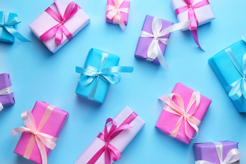 Many Birthday gifts on color background