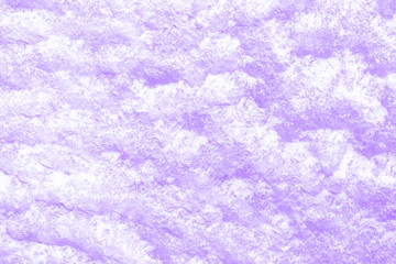violet decorative plaster background, purple stucco wall with copyspace, abstract wallpaper close up ,sea salt texture macro