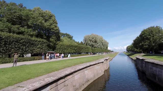 Walking in St. Petersburg on a summer day. Peterhof, Samoson canal