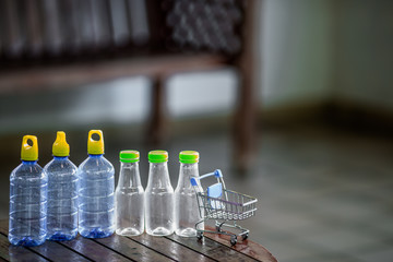 Blurred background view of modern design perfume bottles placed on the table, sales and beauty business concept