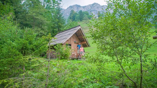 Enjoy the view outside a mountain cabin. Mountains in the background. Topla Valley, Slovenia