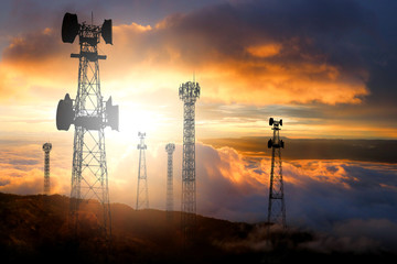 Telecommunication pole With a sunset background