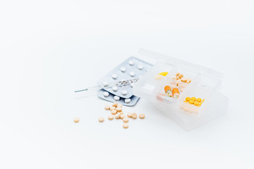 Fototapeta na wymiar Storage and combination of various types of drugs and thermometer