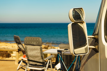 Tourist table and chair on seaside, camping.