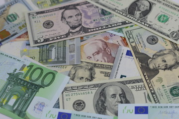 various currencies from countries spanning the World . financial crisis 2020